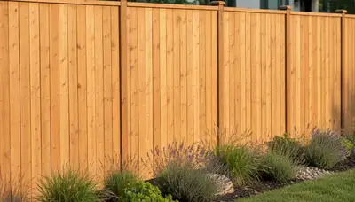 White wooden privacy fence installation by professional landscapers in Denver, CO